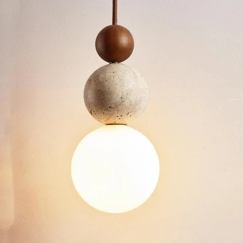 Solara kő- és fa függeszték lámpa wabi sabi stílusban, finom világításhoz és dekorációhoz