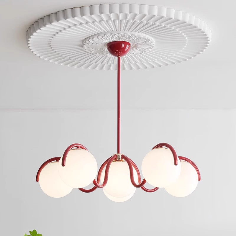 Lámpara colgante con globo de vidrio curva Luxe Crimson de LumaNova para comedores