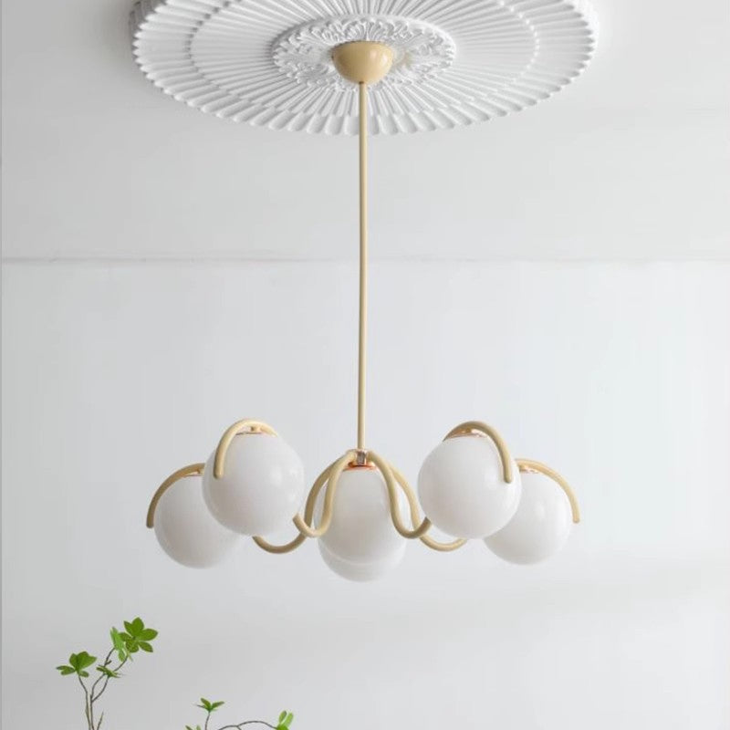 Lámpara colgante con globo de vidrio curva Luxe Crimson de LumaNova para comedores
