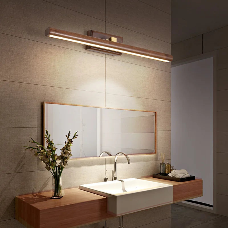 Luz de tocador artesanal BirchGlow de nogal negro con un brillo cálido y suave para baños