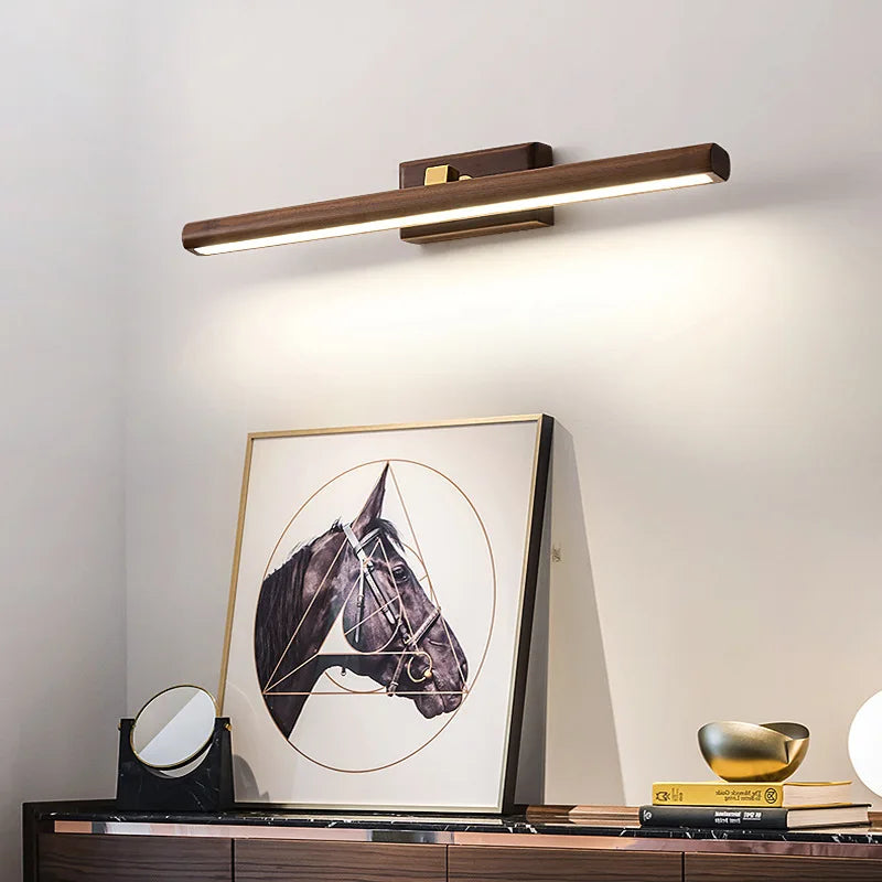Luz de tocador artesanal BirchGlow de nogal negro con un brillo cálido y suave para baños