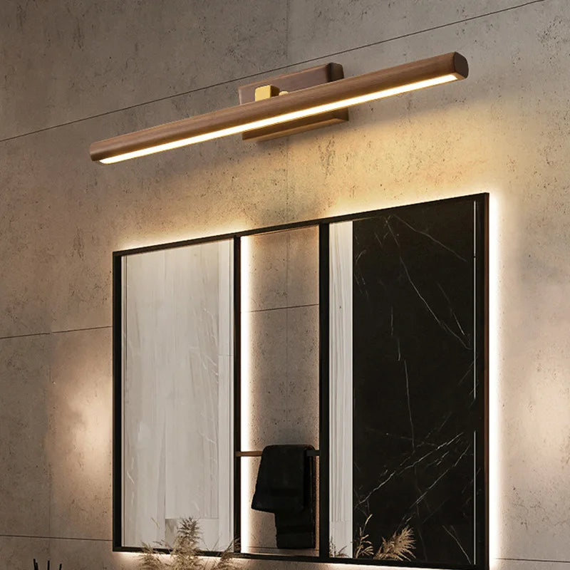 Luz de tocador artesanal BirchGlow de nogal negro con un brillo cálido y suave para baños